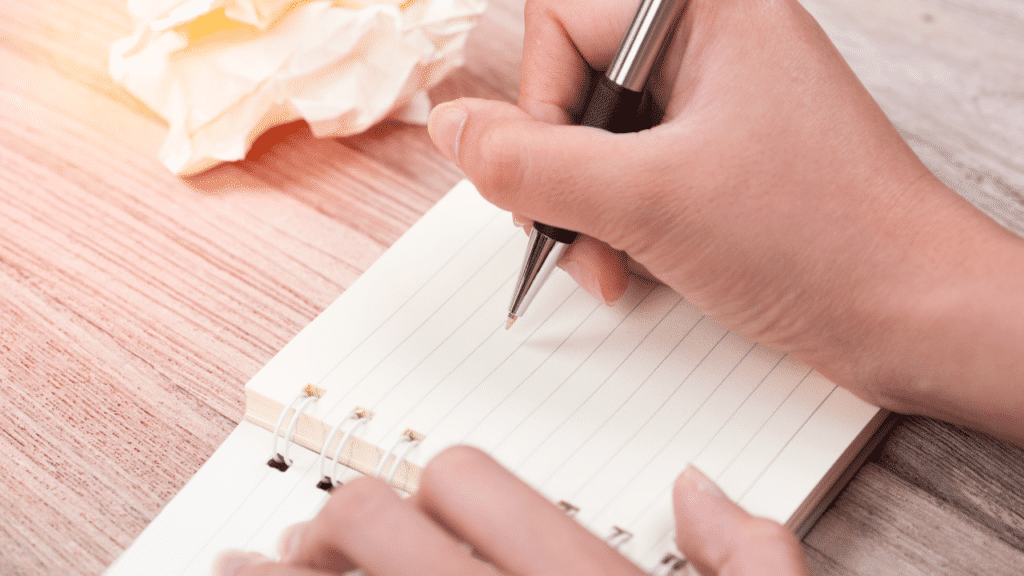 Writing on a memo pad to set priorities 