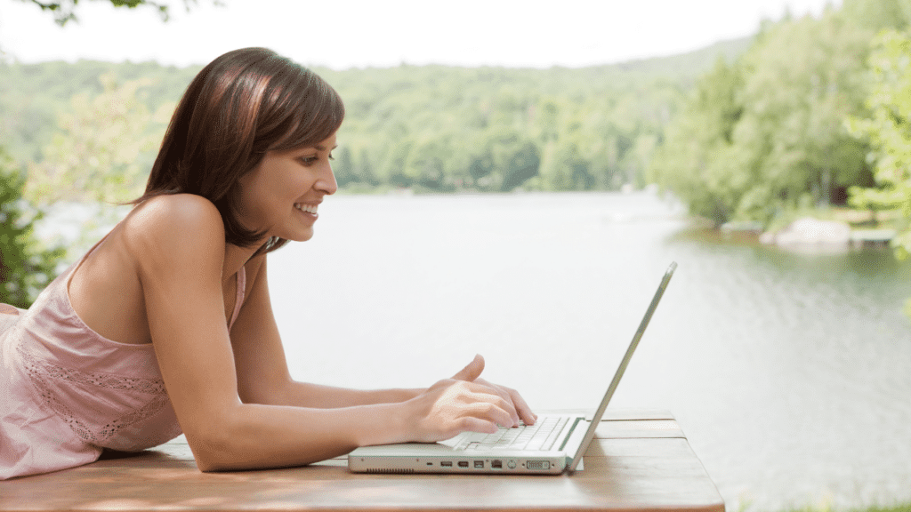 Woman working remotely while enjoying her time